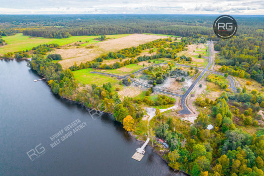 Участок на первой линии озера, 27,42 соток, Ленинградская область, Приозерский район, коттеджный посёлок Отрадная Бухта тер.